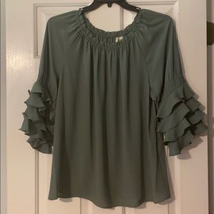 Women’s silk blouse with ruffles sleeves